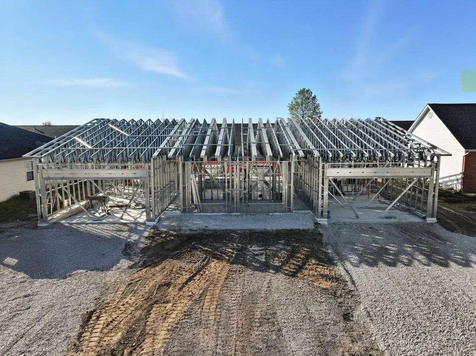 Roof trusses and wall panels of The Duo's steel frame